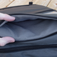 A massive pocket with a soft lining helps keep your sunglasses and smartphone scratch-free. (Image: Andrew Liszewski/Gizmodo)